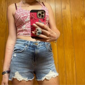 Size 4 Jean shorts with cute pocket ripped designs